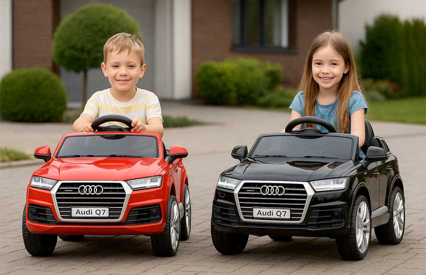 Dziewczynka i chłopiec w czerwonym i czarnym samochodzie elektrycznym Audi Q7 dla dzieci 10 lat
