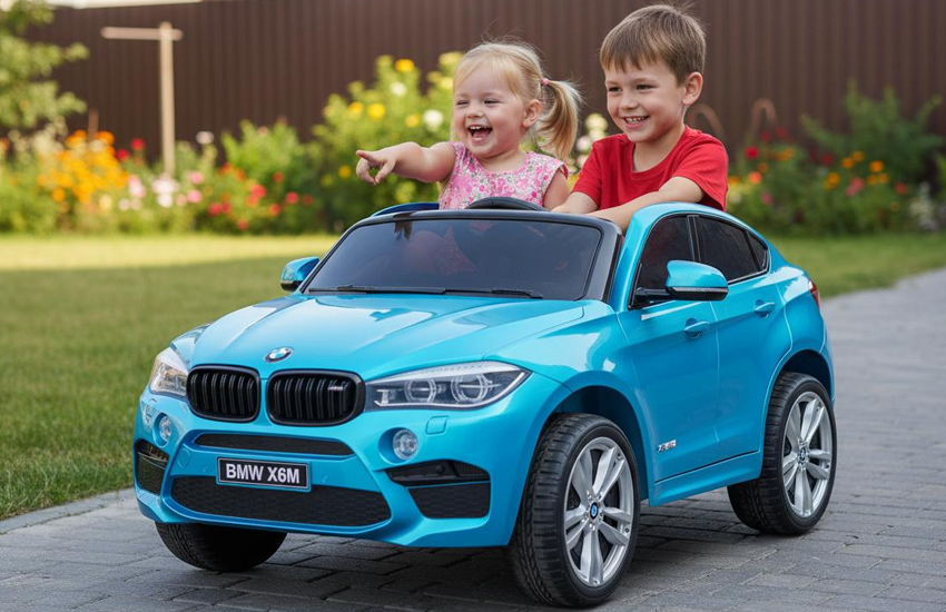 Dwoje dzieci w niebieskim BMW X6M