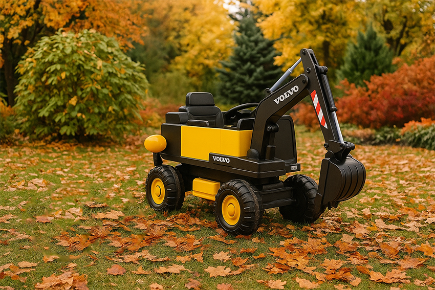Zabawa koparką Volvo jesienią